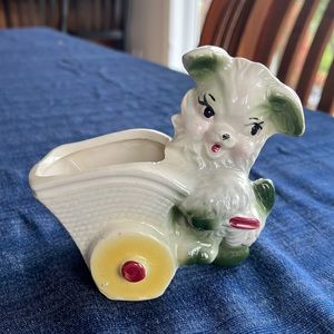 Vintage Dog pushing cart small planter. Unmarked on bottom except for a 2.